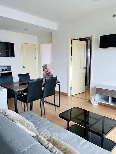 Modern living room with sleek furniture and open layout, perfect for contemporary living.