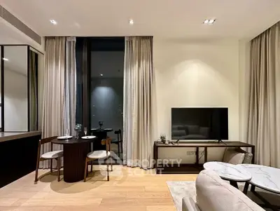 Modern living room with elegant decor and large window view