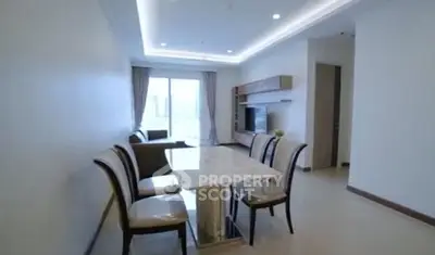 Spacious modern living room with elegant dining area and natural light