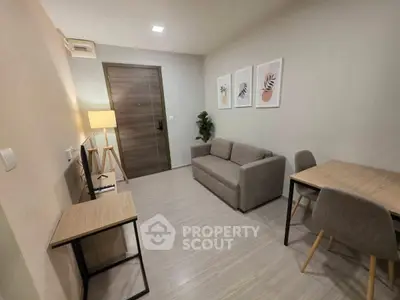 Modern living room with cozy sofa, stylish decor, and wooden furniture in a contemporary apartment.