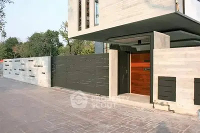 Modern architectural entrance with sleek design and contemporary materials.
