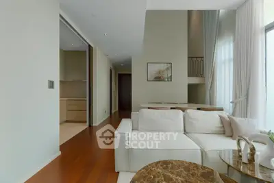 Luxurious modern living room with high ceilings and elegant decor