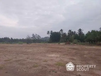 Expansive land plot with scenic views and lush greenery, perfect for development opportunities.