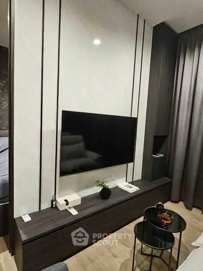 Modern living room with sleek TV setup and stylish decor