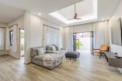 Spacious modern living room with natural light and stylish decor