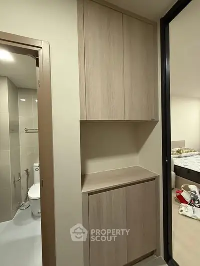 Modern bathroom with sleek cabinetry and neutral tones