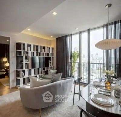 Luxurious modern living room with city view, elegant decor, and open dining area.