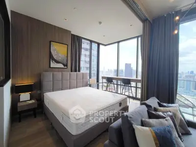 Luxurious bedroom with stunning city view and modern furnishings
