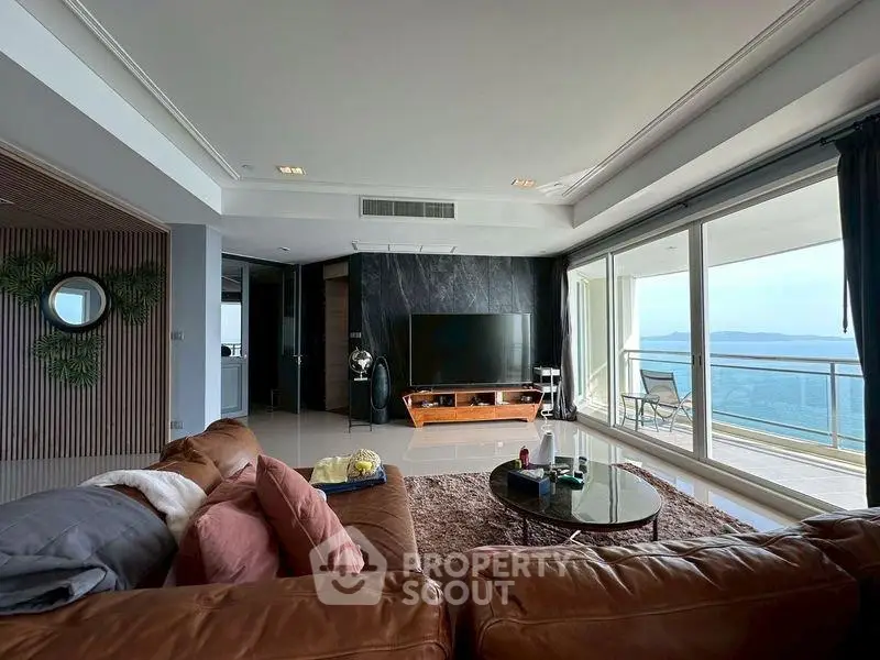 Luxurious living room with stunning ocean view and spacious balcony