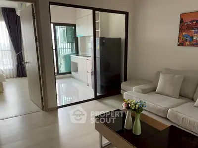 Modern apartment interior with cozy living room and sleek kitchen