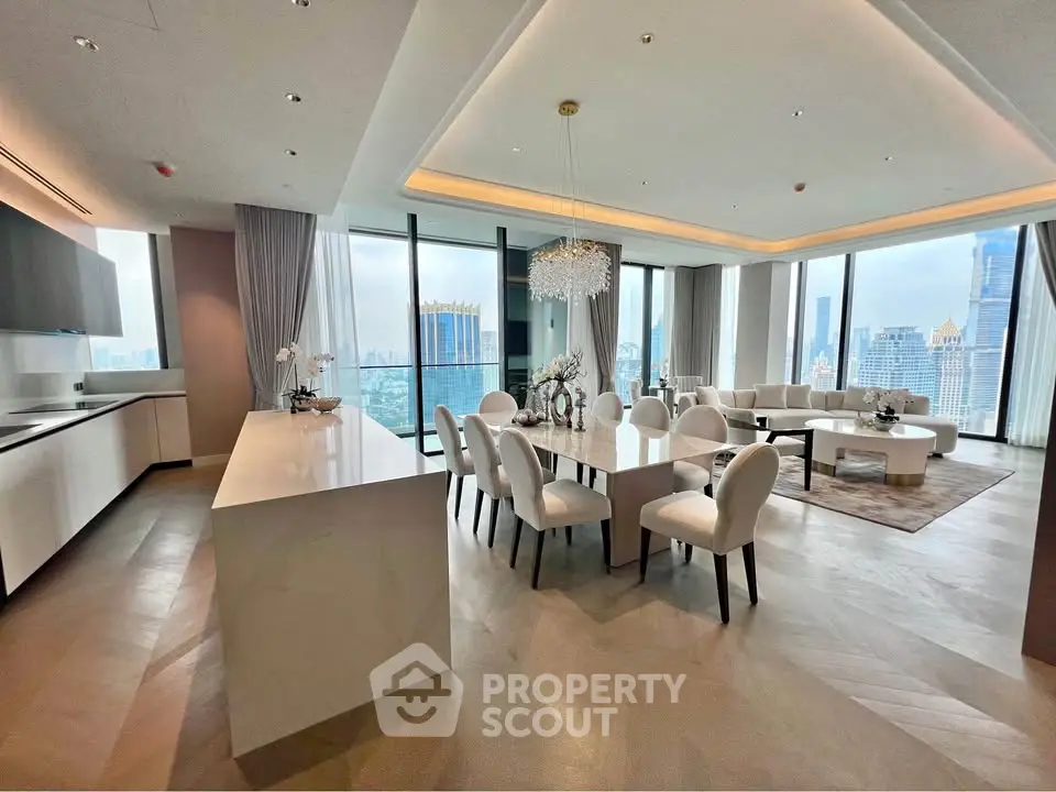 Luxurious open-layout living and dining area with panoramic city views and elegant furnishings.