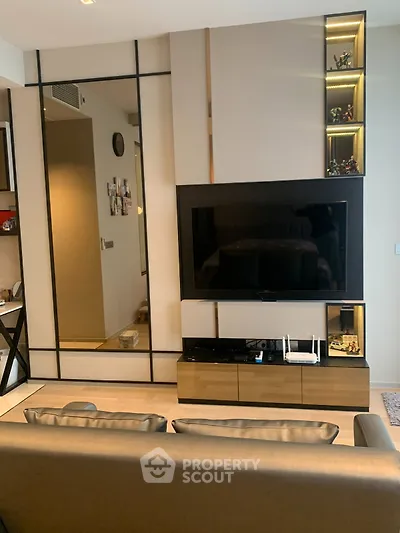 Modern living room with sleek TV unit and stylish decor