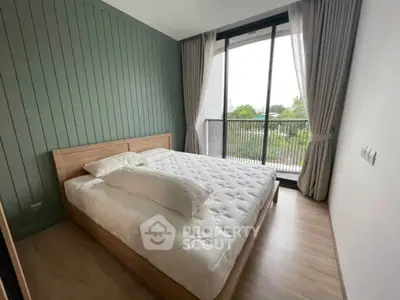 Modern bedroom with large window and balcony view, featuring a stylish wooden bed and elegant curtains.
