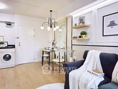 Modern living room with chic decor and washing machine, perfect for urban living.