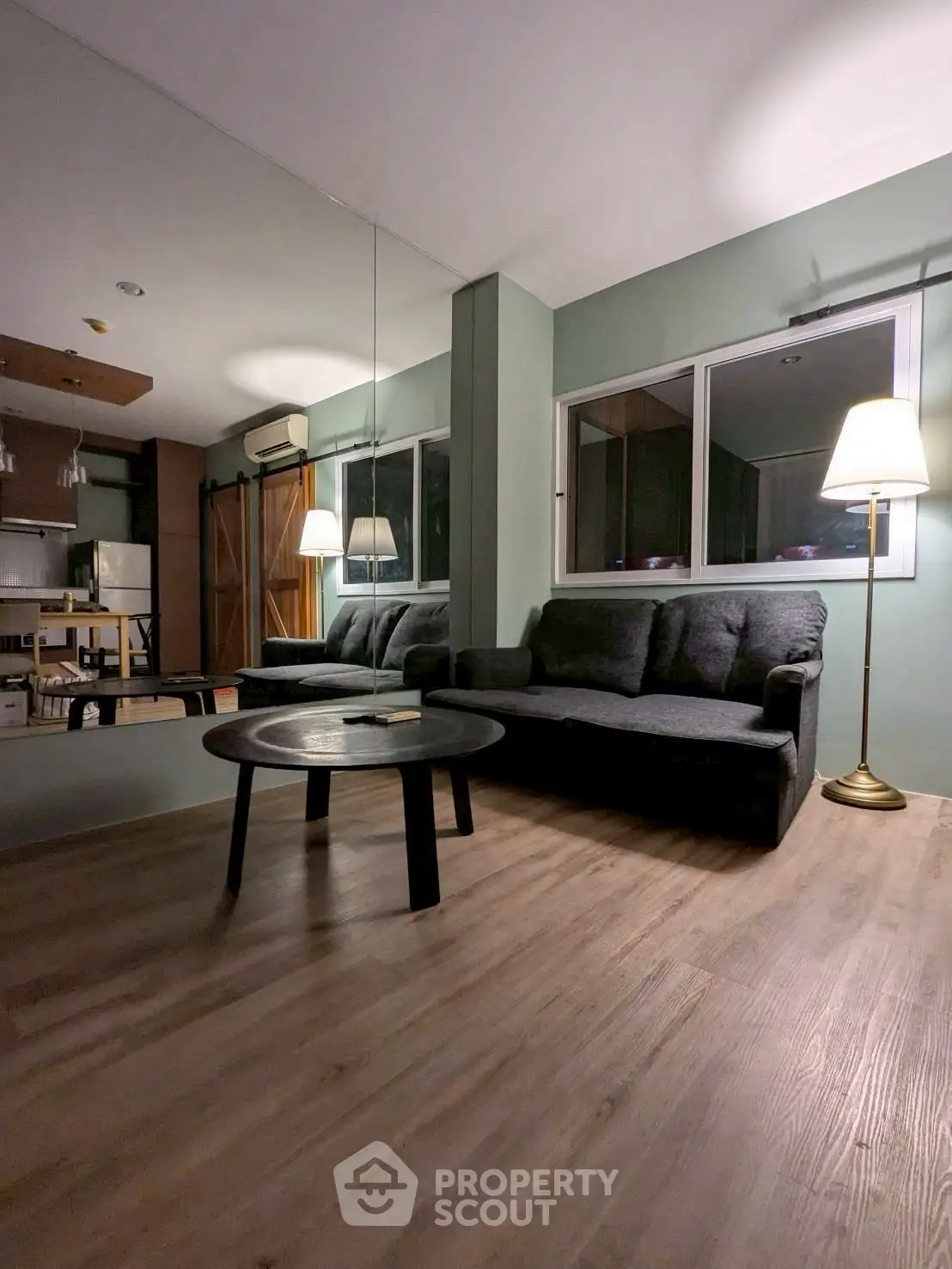 Cozy living room with modern decor and wooden flooring