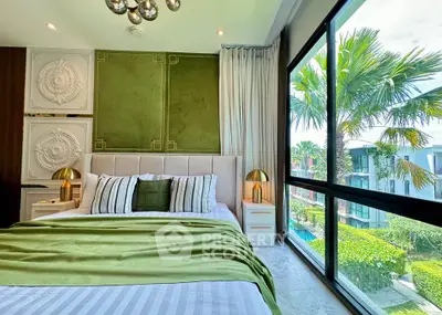 Luxurious bedroom with large window and lush garden view, featuring elegant decor and modern furnishings.