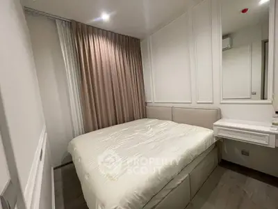 Cozy modern bedroom with elegant decor and soft lighting, perfect for relaxation and comfort.
