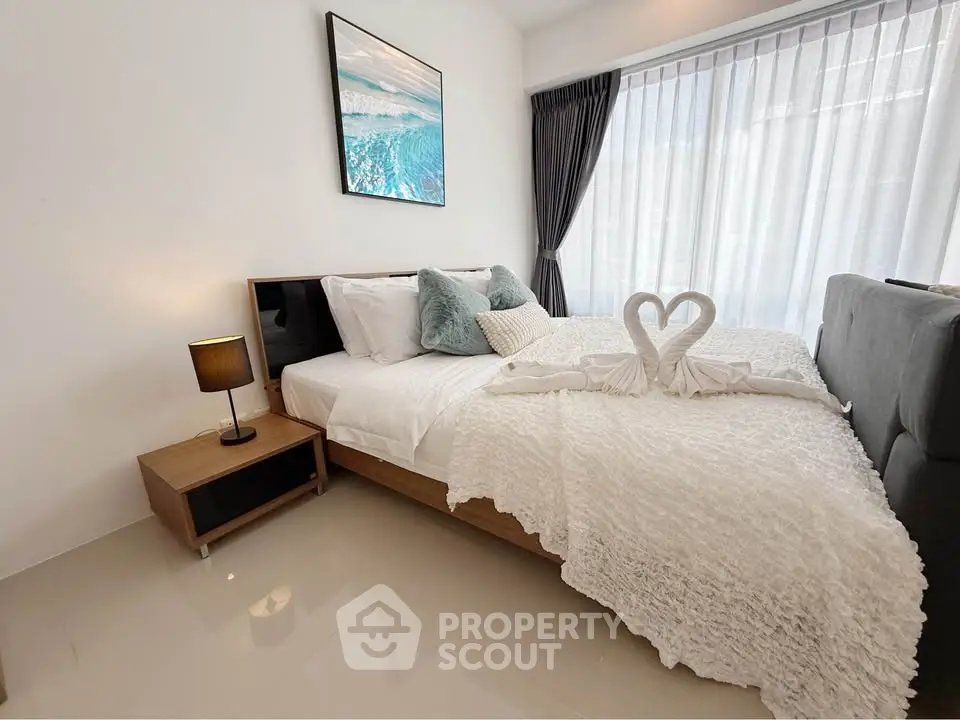 Modern bedroom with elegant decor and natural light