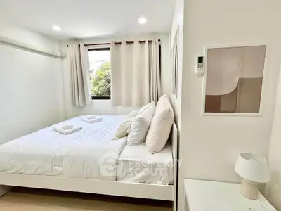 Bright and cozy bedroom with modern decor and natural light