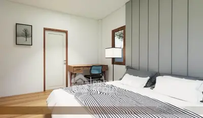 Modern bedroom with stylish decor and wooden flooring