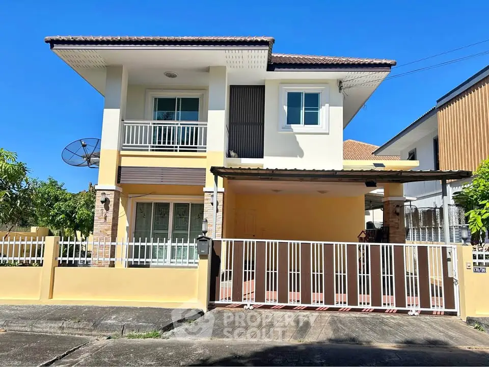 Charming two-story house with modern design and spacious driveway