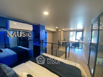 Modern bedroom with stylish decor and air conditioning in a luxurious apartment.