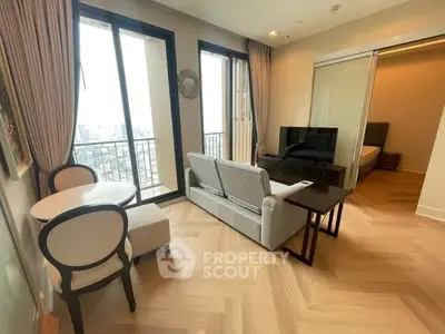 Modern living room with city view, elegant furniture, and cozy ambiance.