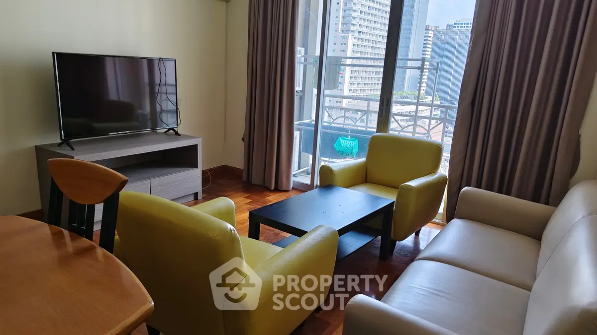 Modern living room with balcony view in urban apartment