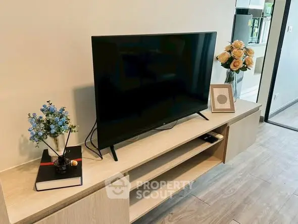 Modern living room with sleek TV setup and elegant decor