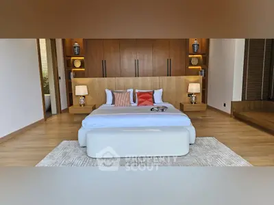 Luxurious bedroom with elegant decor and wooden accents