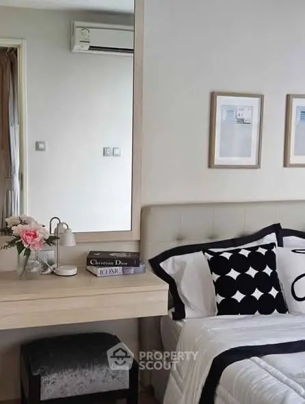 Stylish bedroom with elegant decor and cozy bedding