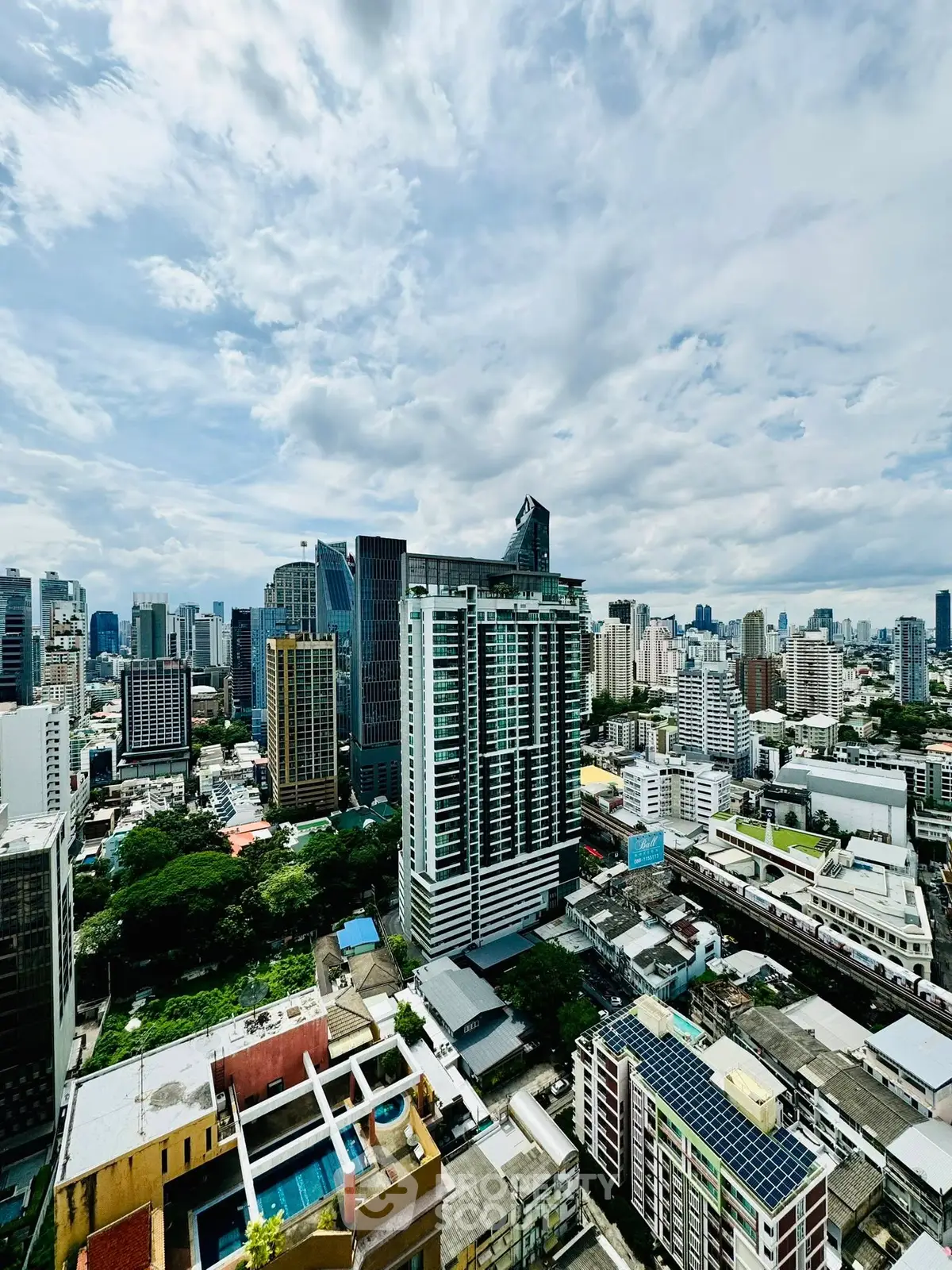 Stunning cityscape view showcasing modern skyscrapers and urban landscape under a vibrant sky.