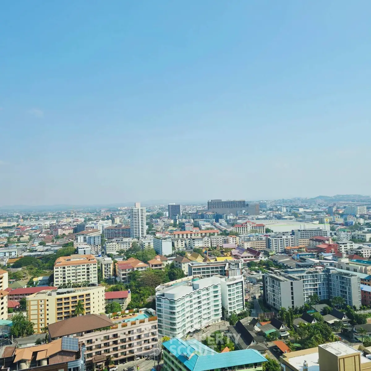 Stunning panoramic cityscape view from a high-rise building, showcasing urban living.