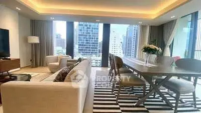 Luxurious modern living room with city view and elegant dining area