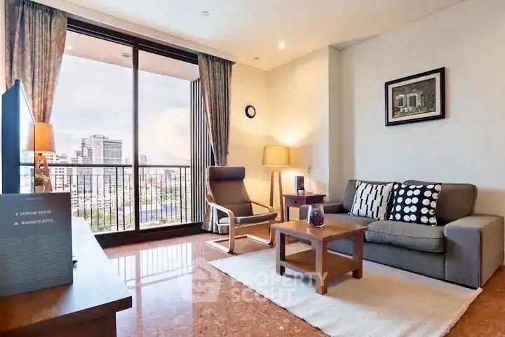 Spacious living room with city view, modern furniture, and elegant decor.