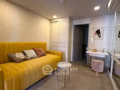 Stylish living room with modern yellow sofa and chic decor