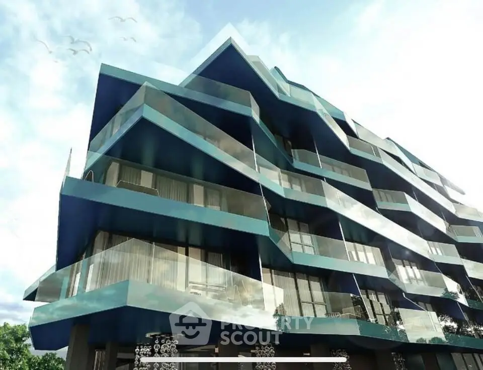 Modern architectural building with unique geometric design and glass balconies.