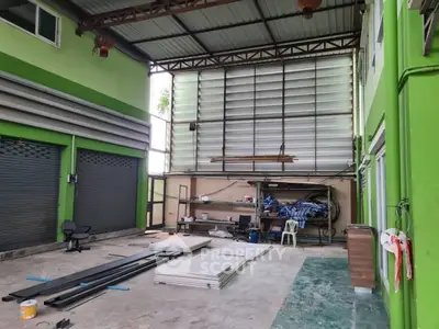 Spacious industrial warehouse with high ceilings and ample storage space