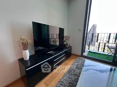 Modern living room with sleek TV stand and city view balcony, perfect for urban living.