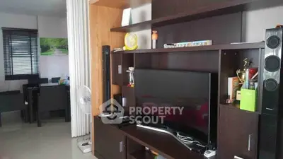 Modern living room with sleek entertainment center and stylish decor