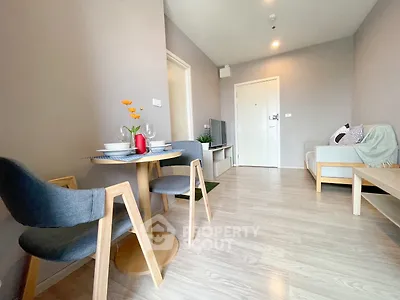 Modern living room with stylish furniture and open layout in a cozy apartment.