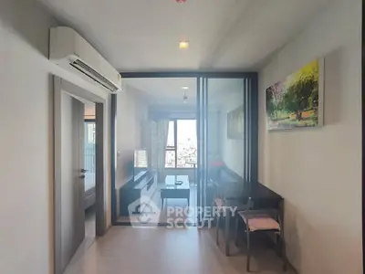 Modern apartment interior with glass partition and stylish decor