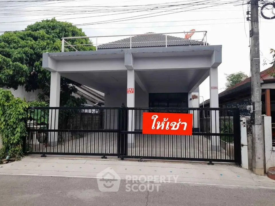 Modern house with gated entrance and spacious driveway for rent