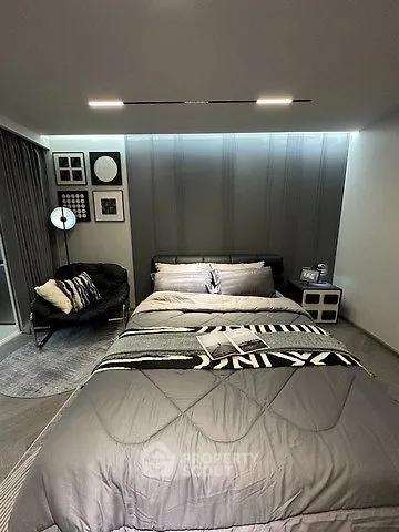 Modern bedroom with stylish decor and cozy ambiance