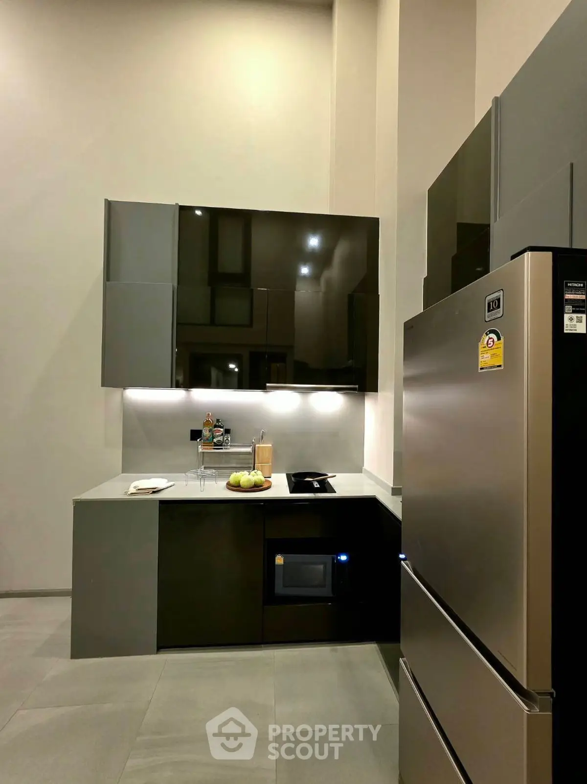Modern kitchen with sleek cabinets and stainless steel appliances