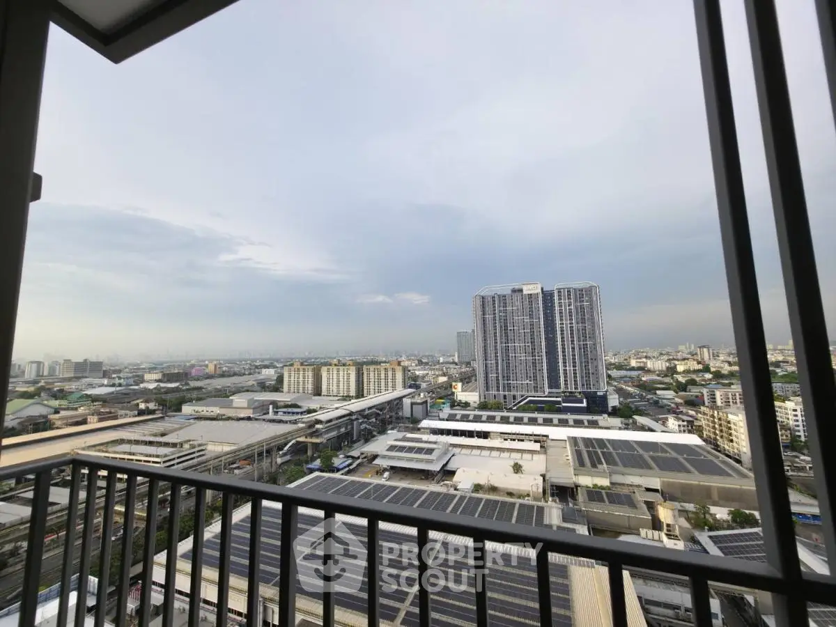Stunning cityscape view from a high-rise balcony, perfect for urban living.