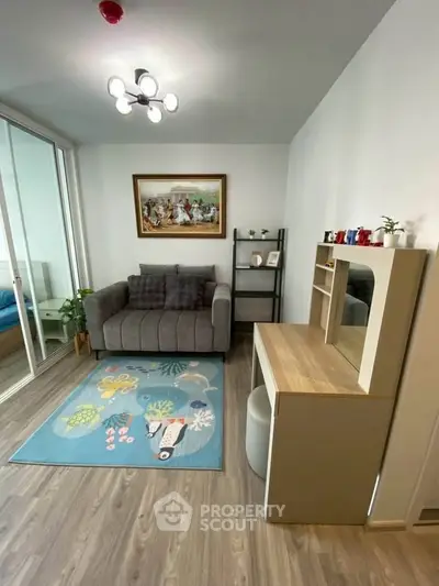 Cozy living room with modern decor and stylish furniture in a bright apartment.