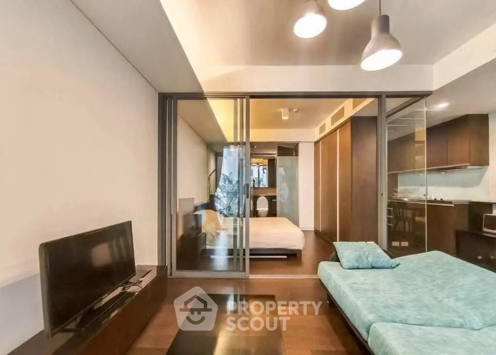 Modern studio apartment with open layout and stylish furnishings