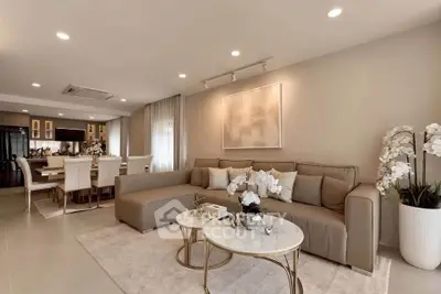 Luxurious open-plan living room with elegant decor and modern furniture