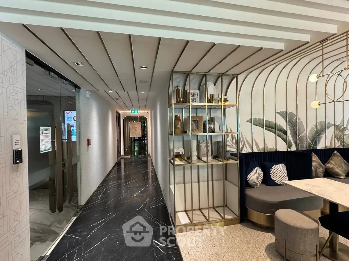 Luxurious modern lobby with elegant decor and stylish seating area, perfect for welcoming guests.